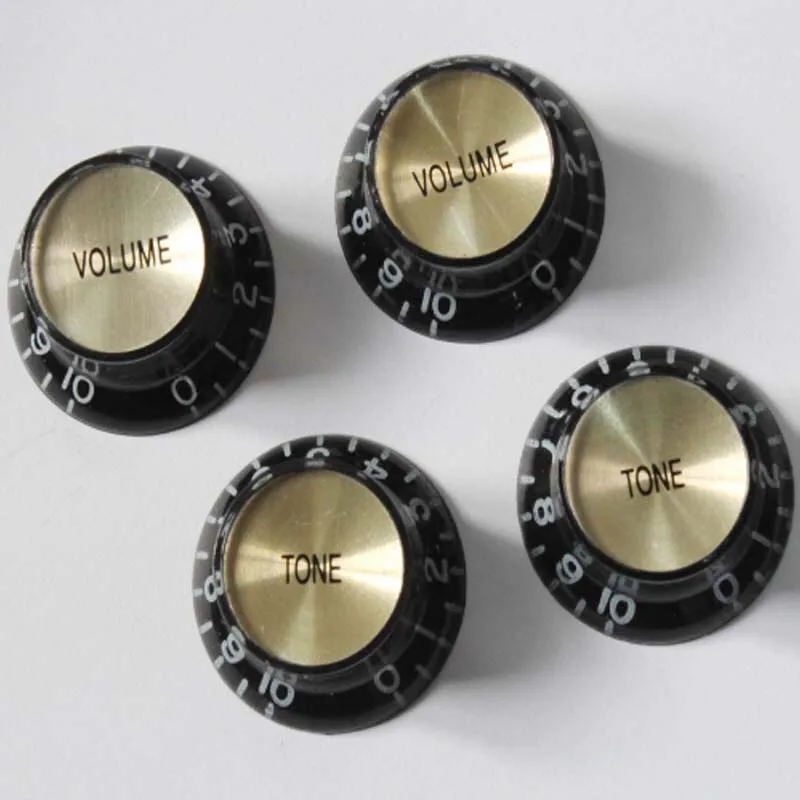 A Set of 4 pcs black Speed Control Knobs for Electric Guitar