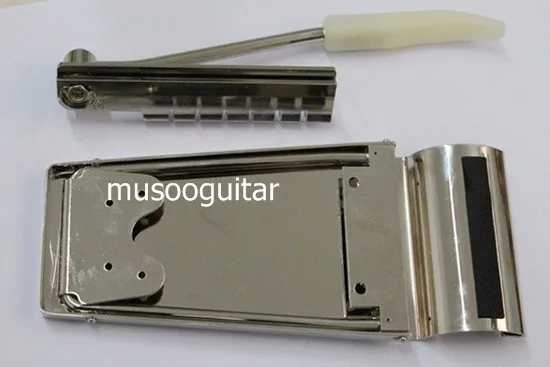 Long Verson Maestro Vibrola Tremolo with G logo in chrome